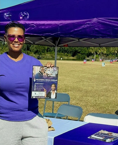 Brandy "BJ" Essex, founder of W.E. M.O.V.E., Intentionally, at a community outreach event
